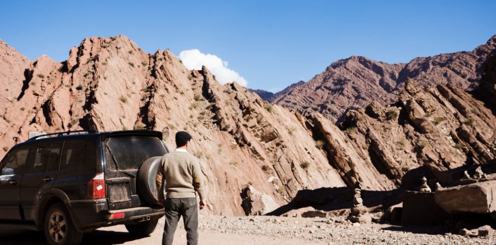 Nepal travel deals man enjoying mountain view